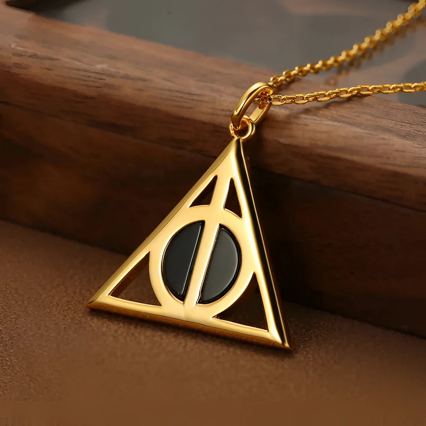 Sophisticated Black Agate Deathly Hallows Gold Necklace
- ModishWorld