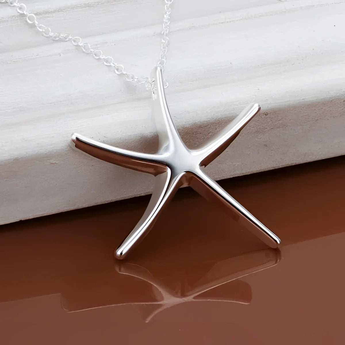 Stylish Starfish Sterling Silver Pendant: Coastal Beach Jewelry
- ModishWorld