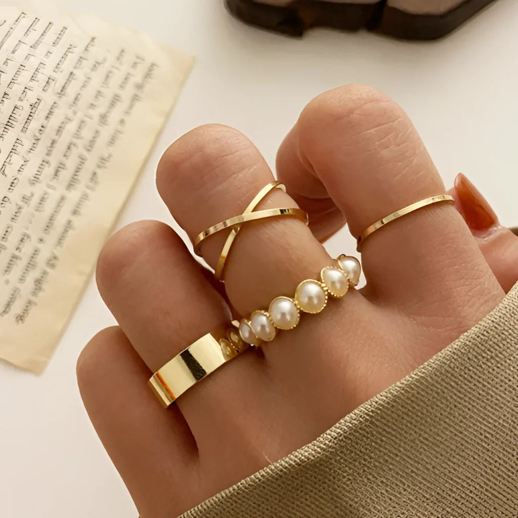 Elegant Minimalist Stackable Gold Rings with Pearl Details
- ModishWorld