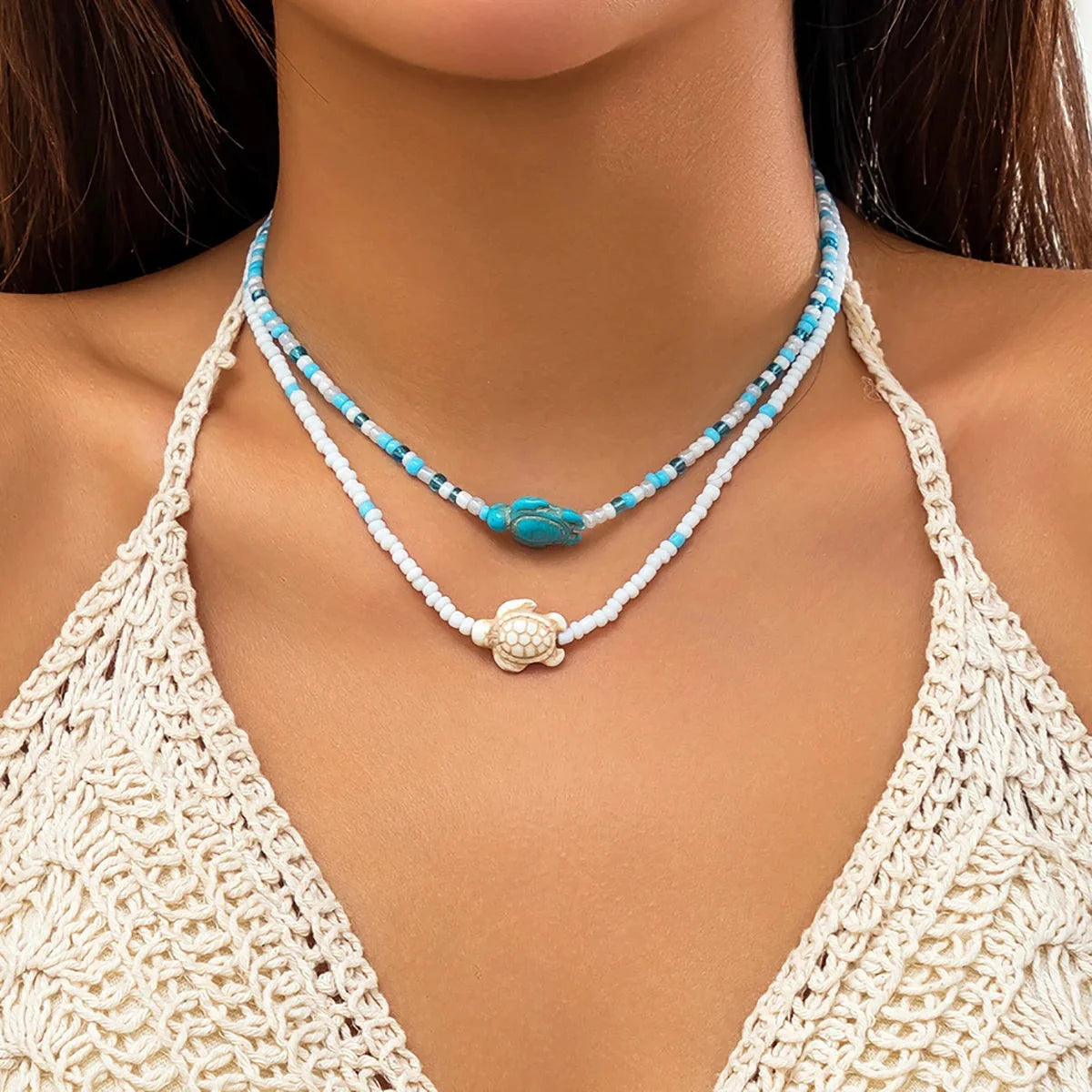 Bohemian Summer Beach Necklace: Turquoise, White Layers, Sea Turtle Charm
- ModishWorld