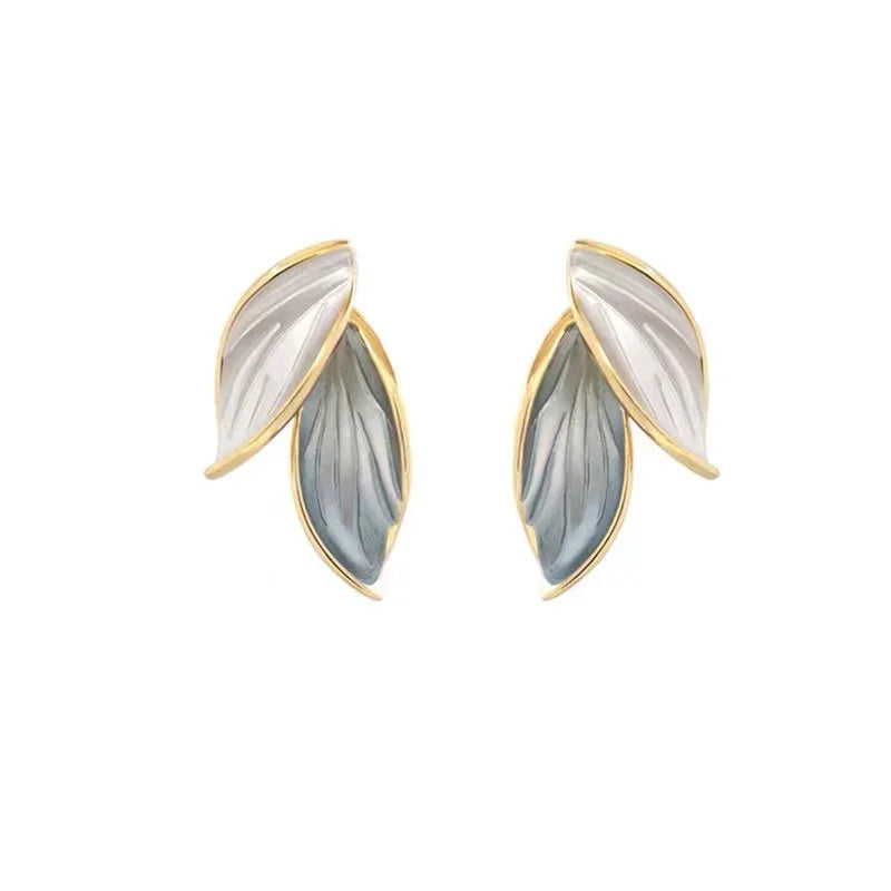 White and Blue Pearl-Look Double Leaf Earrings
- ModishWorld