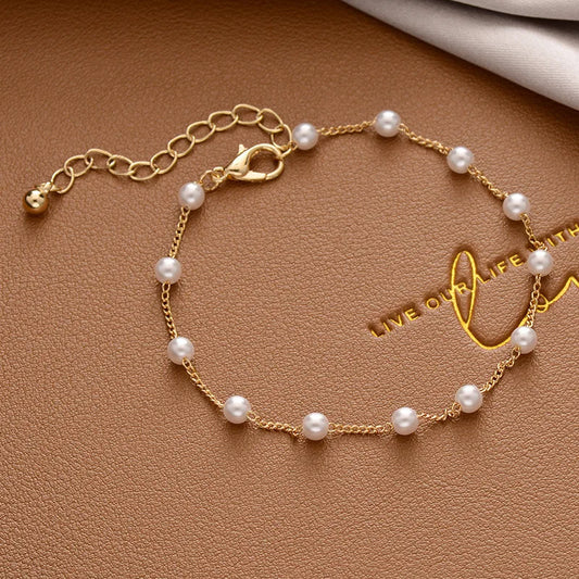 Adjustable Gold Pearl Bracelet with Elegant Design
 - ModishWorld