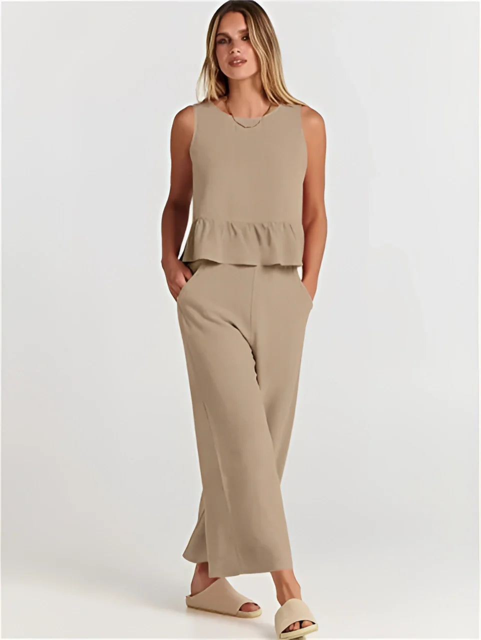 Stylish Beige Sleeveless Wide-Leg Peplum Jumpsuit for Summer Office
 - ModishWorld