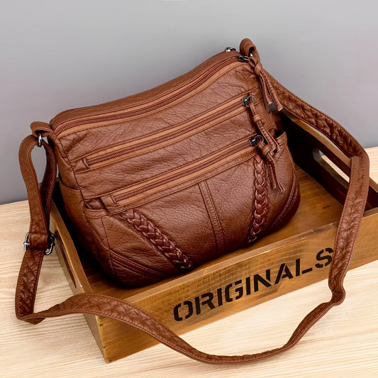 Women's Brown Leather Crossbody Bag with Multiple Zippers and Braided Detail
 - ModishWorld