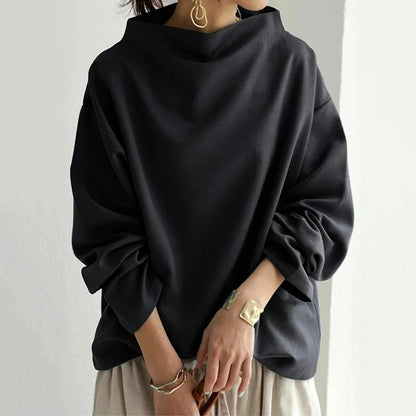 Stylish Black Batwing Cowl Neck Jumper: Oversized & Minimalist
 - ModishWorld
