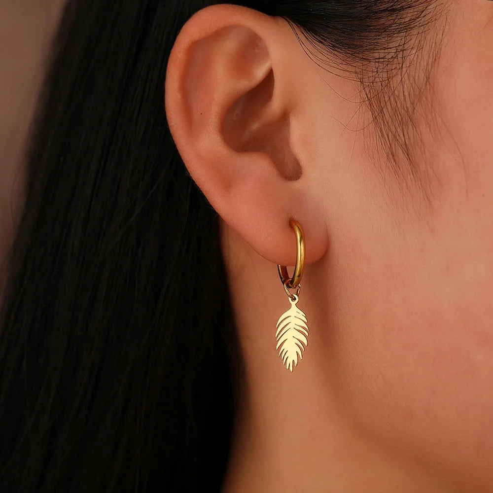 Nature-Inspired Botanical Gold Leaf and Feather Earrings
 - ModishWorld