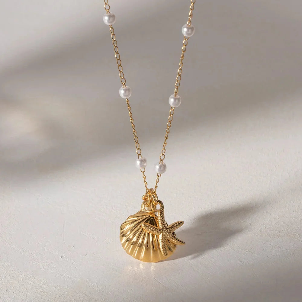 Nautical Necklace with Gold Scallop and Starfish Pearl Charm
 - ModishWorld