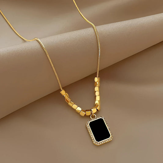 Adjustable Black Pendant Necklace with Gold Snake Chain and Beveled Crystal
 - ModishWorld