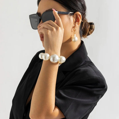 Elegant Pearl Jewelry Set: Necklace, Bracelet, and Earrings –  High-Fashion Style
 - ModishWorld