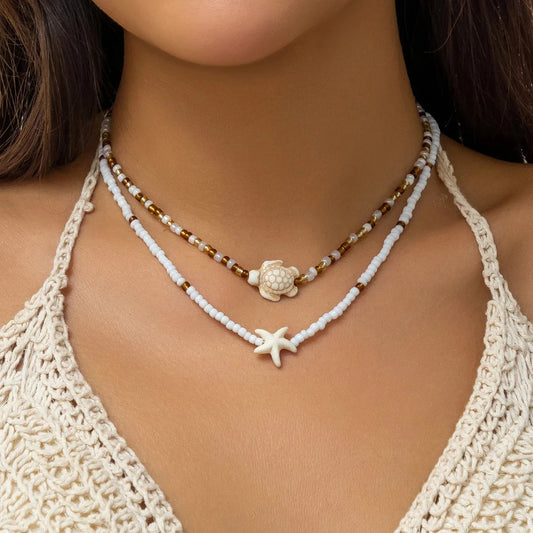 Bohemian Summer Necklace: Layered Design with Sea Turtle and Starfish Charms
 - ModishWorld
