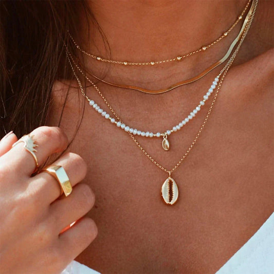 Minimalist Layered Necklaces: Pearls, Seashell Charm
 - ModishWorld
