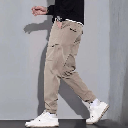 Beige Men's Cargo Pants with Multiple Pockets and Tapered Legs
 - ModishWorld