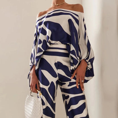Abstract Print Jumpsuit: Navy Blue, White, Off-Shoulder, Asymmetrical Drape, Designer Style
 - ModishWorld