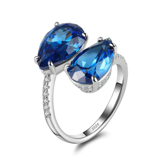 Luxury ORSA 925 Sterling Silver Ring with Double Blue Topaz Teardrops
 - ModishWorld