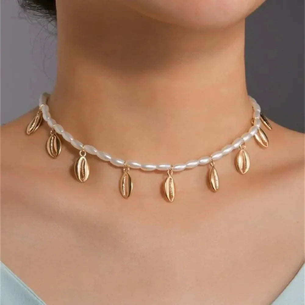 Elegant Pearl Choker Necklace featuring a Gold Leaf Pendant
 - ModishWorld