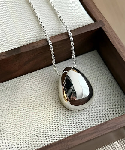 Minimalist Silver and Gold Teardrop Necklace with Reflective Finish
 - ModishWorld