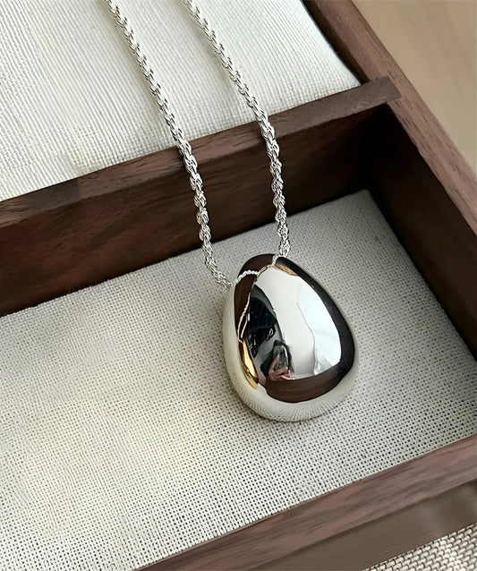 Minimalist Silver and Gold Teardrop Necklace with Reflective Finish
 - ModishWorld