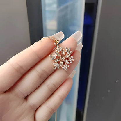 Luxury Diamond Snowflake Pendant in Gold: A Festive Winter Gift
 - ModishWorld