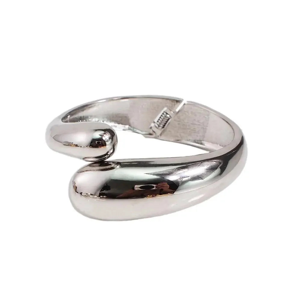 Modern Designer Ring in Gold and Silver Tones
 - ModishWorld