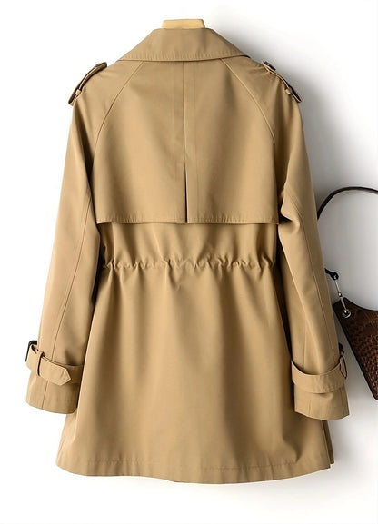 Beige Trench Coat for Women: Classic Fall Outerwear with a Defined Waist
 - ModishWorld