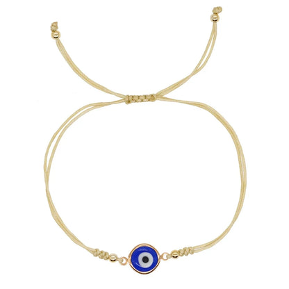 Adjustable Evil Eye Bracelet with Yellow Cord, Gold Beads, and Good Luck Charm
 - ModishWorld