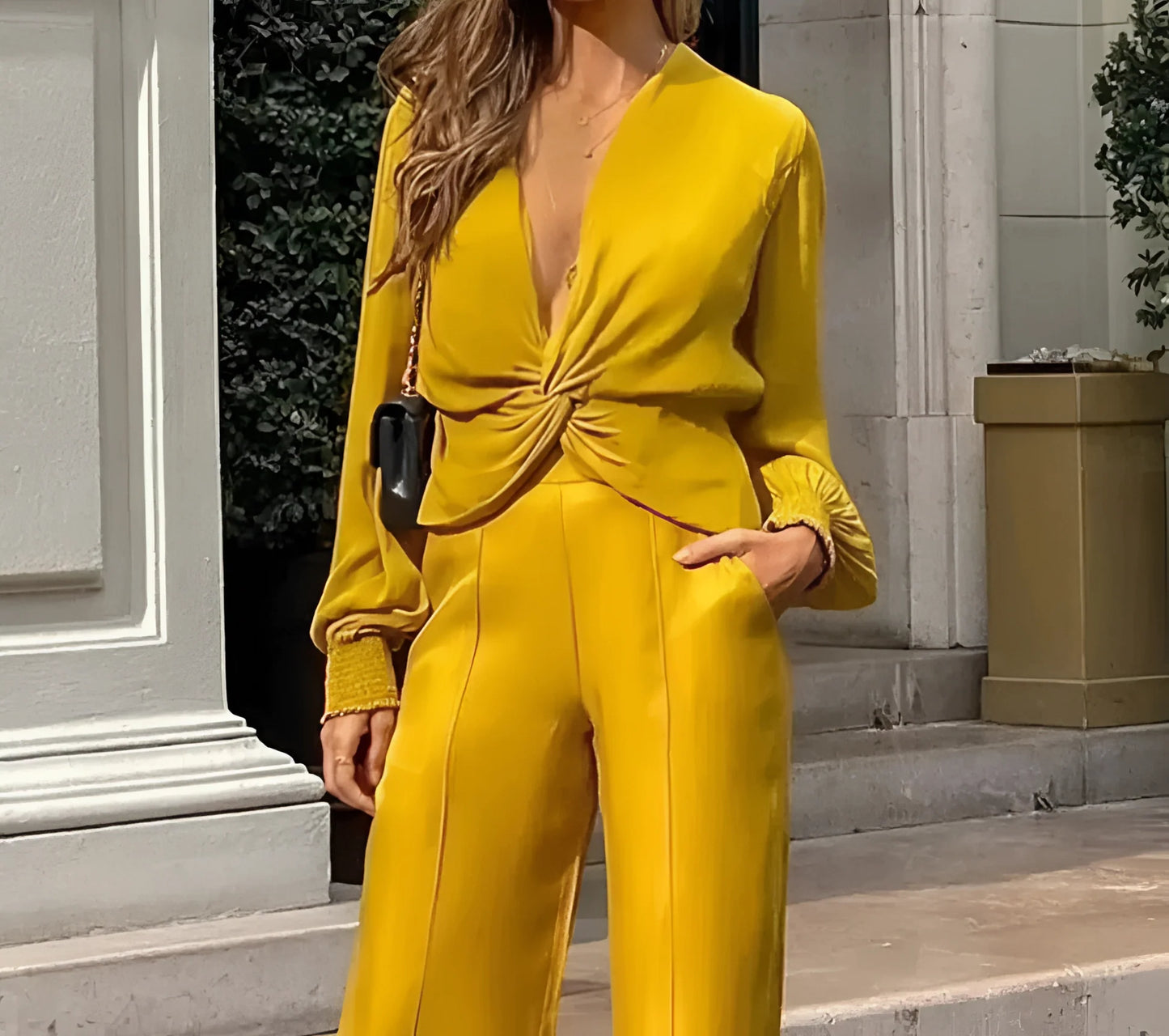 Women's Long-Sleeve Yellow Mustard Jumpsuit with Twisted Front and Deep V-Neck
 - ModishWorld