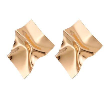 Sculptural Twisted Gold Earrings: Modern Geometric Abstract Design
 - ModishWorld