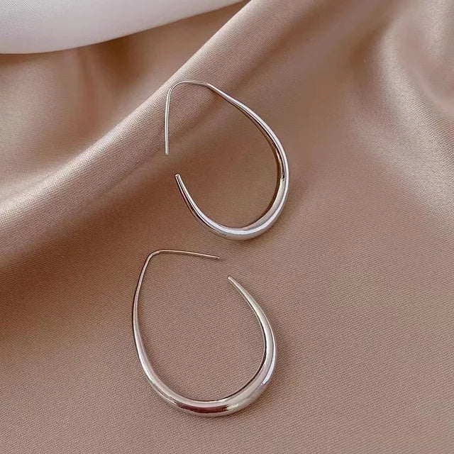 Hoop Earrings: Curved Design, Gradually Thinner
 - ModishWorld