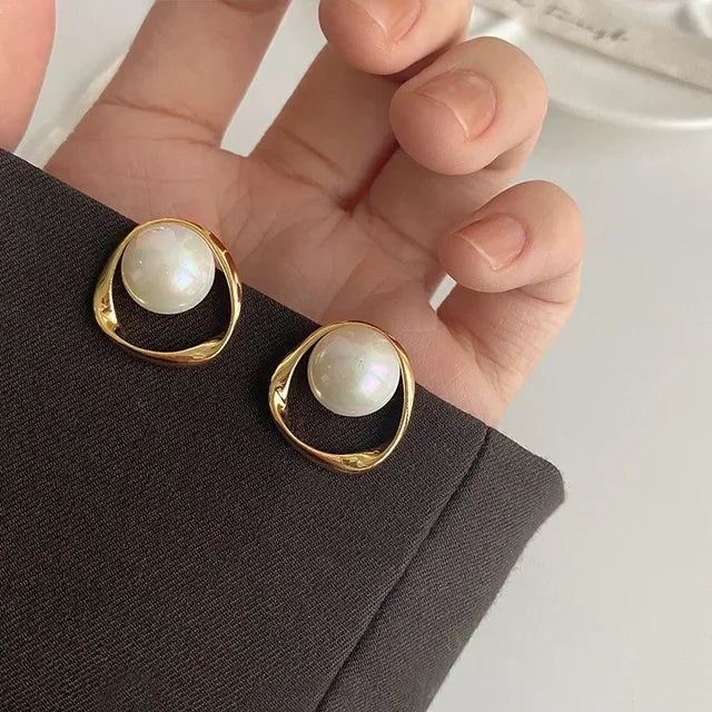 Golden Bezel Earrings with Captured Pearls
 - ModishWorld