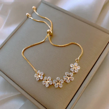 Adjustable Crystal-Embellished Gold Flower Bracelet for Women
 - ModishWorld