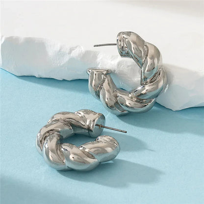 Gold & Silver Spiral Earring for a Striking Look
 - ModishWorld